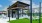 covered patio next to lawn with stringed lighting