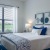 carpeted bedroom with window