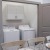 laundry closet with side-by-side washer/dryer units