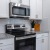 a kitchen with white cabinets