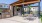 covered patio next to grill pad